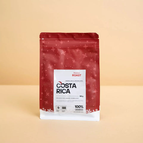 Produktverpackung des CoffeeKult Weihnachtskaffees im weihnachtlichen Design.